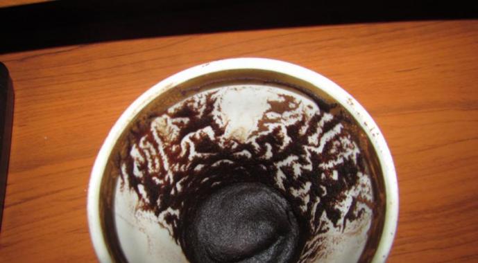 Simbolių aiškinimas ant kavos tirščių